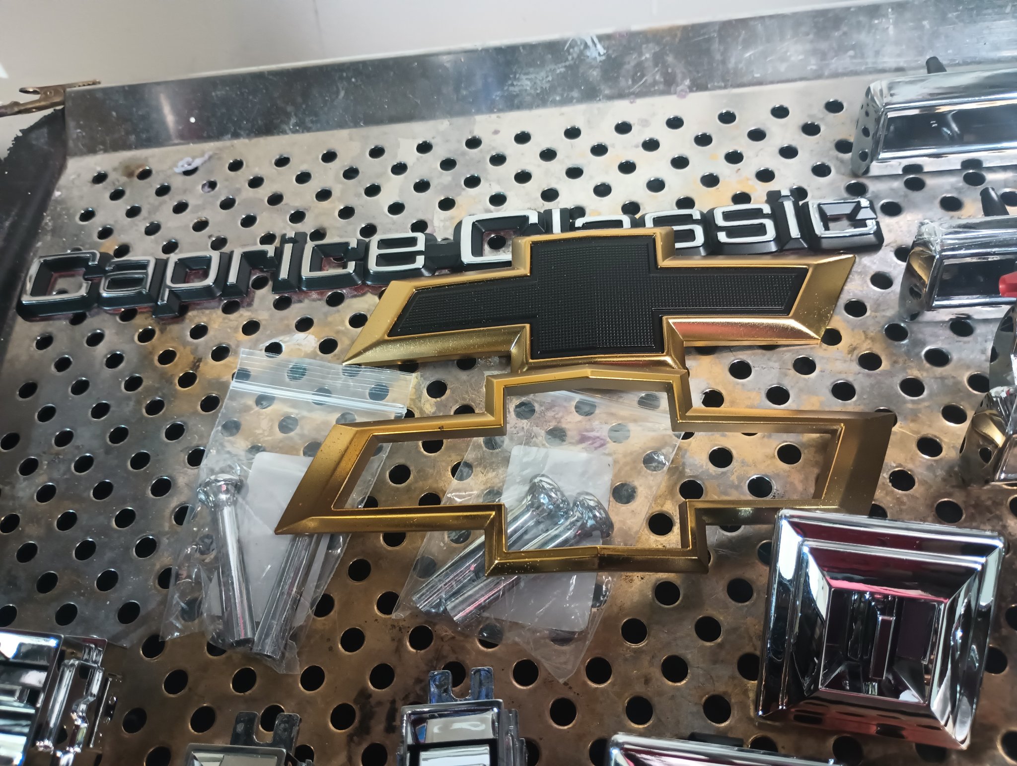 ChromeKarats gold plating work — Caprice Classic Gold Bowtie Emblem Set